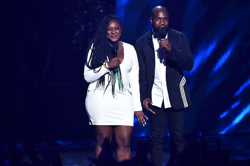 NEW YORK, NY - JULY 11: Co-Founder of Black Lives Matter Alicia Garza (L) and activist/writer Darnell L. Moore speak onstage during the VH1 Hip Hop Honors: All Hail The Queens at David Geffen Hall on July 11, 2016 in New York City. (Photo by Theo Wargo/Getty Images for VH1)